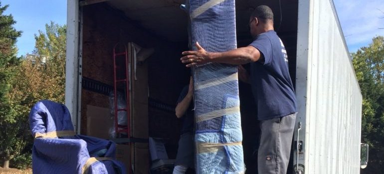 our movers Maryland loading furniture into a truck