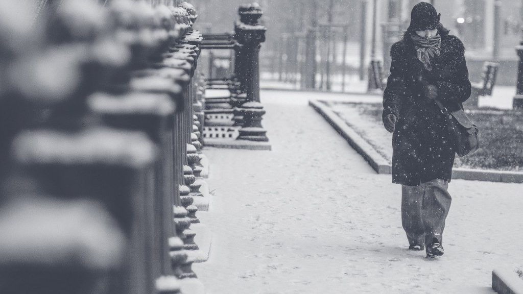 A woman in a blizzard.