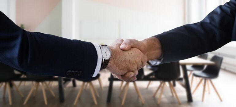 A handshake between two people.