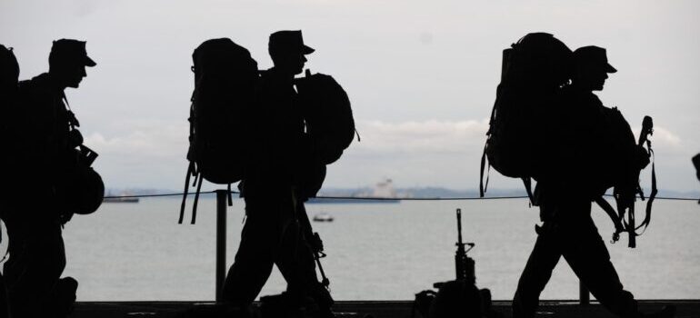 Silhouette of soldiers walking