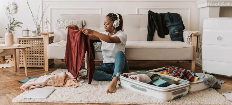 Woman packing clothes