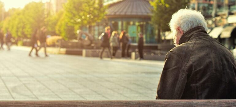 a man sitting in a park