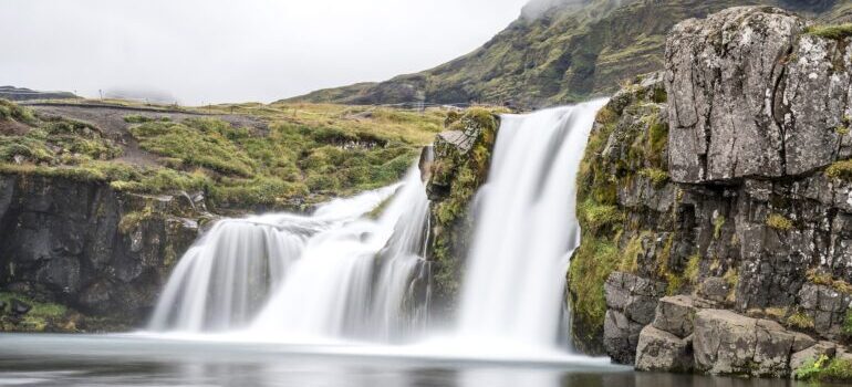 a waterfall with water splashing