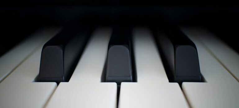 A close up photo of a piano before you prepare your piano for relocation