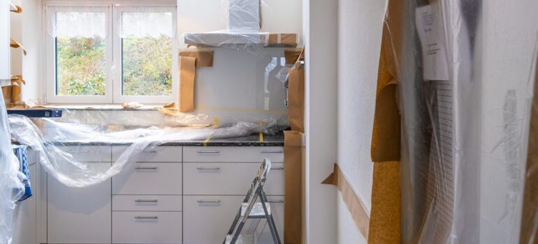 plastic wrap all around the kitchen to protect appliances from paint, a process that will add value to your home in Washington