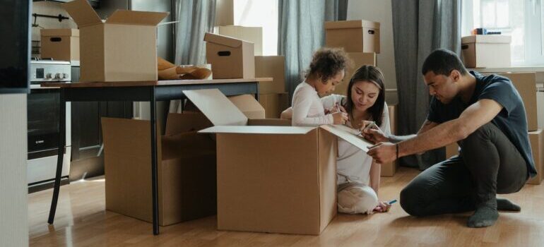 Parents unpacking and wondering how to baby-proof your new home after moving to MD?