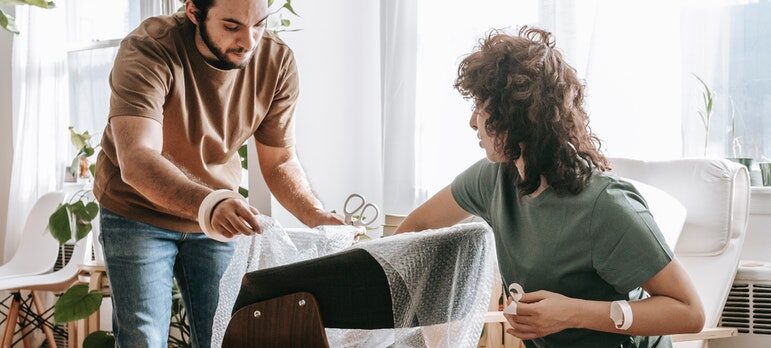 wrapping furniture in bubble wrap will help you avoid damaging floors while moving to Washington