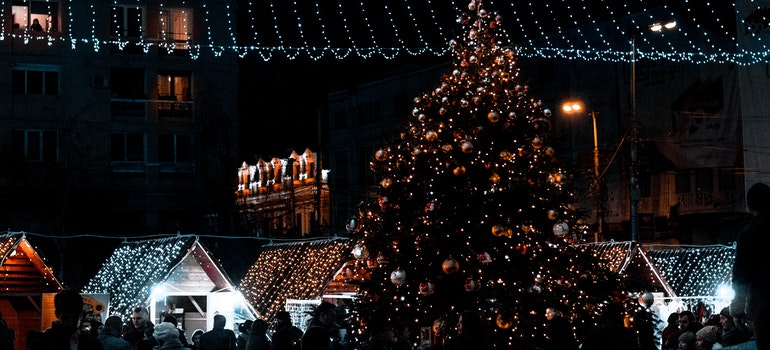 a christmas tree twinkling outside