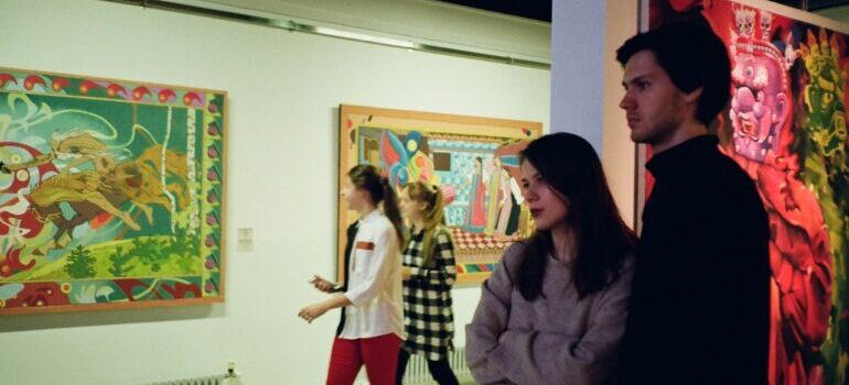 Some people in an art gallery
