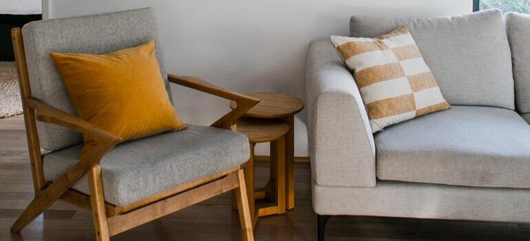 orange pillow on the armchair