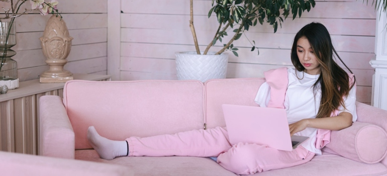 A woman relaxing on the couch