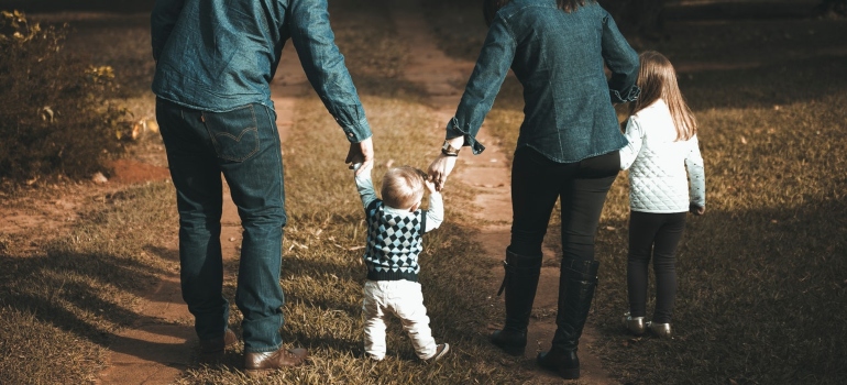 a family of four walking