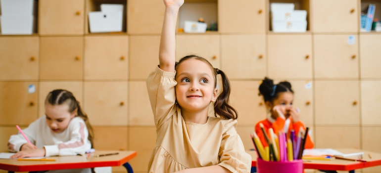 kid raising hand