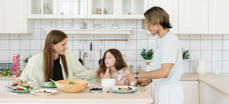 Parents talking to their daughter