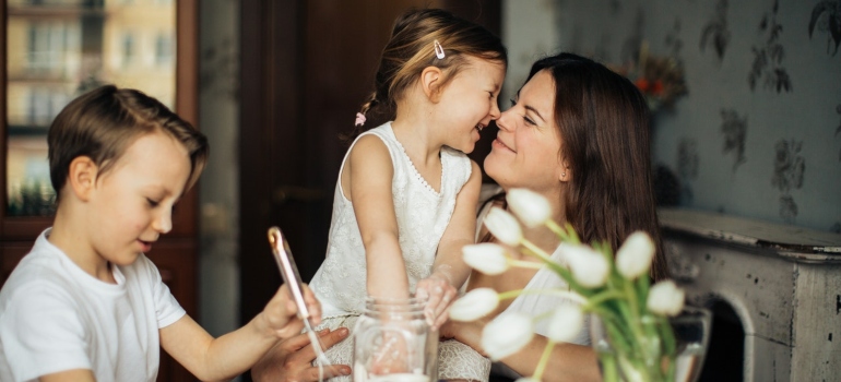 A mom playing with her children