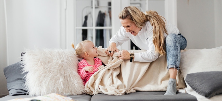 A mother playing with her daughter