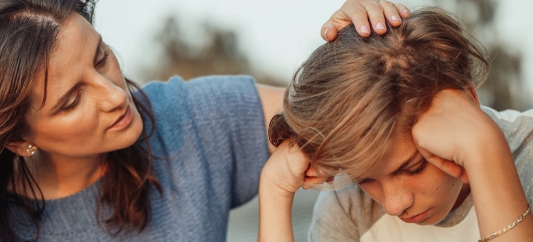 A woman talking to her son