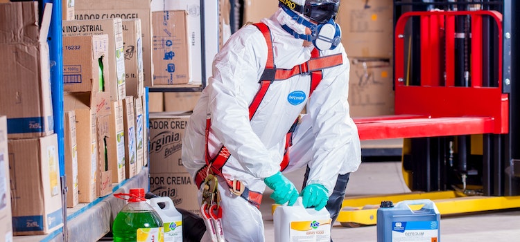 A person handling hazardous materials.