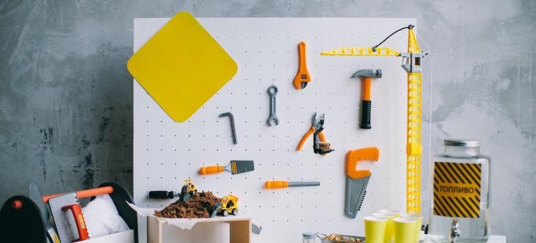 Pegboards with hanging tools