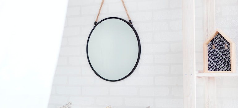 A mirror hanging on a wall