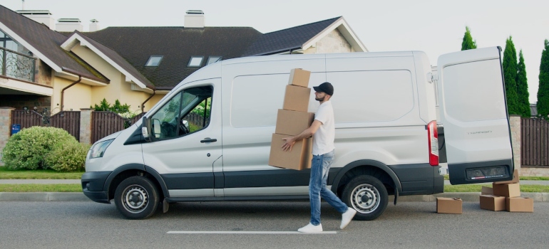 Picture of a person trying to keep your moving boxes organized