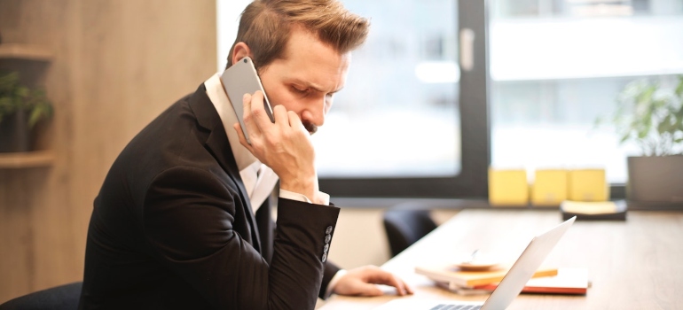 Picture of a man talking on the phone 