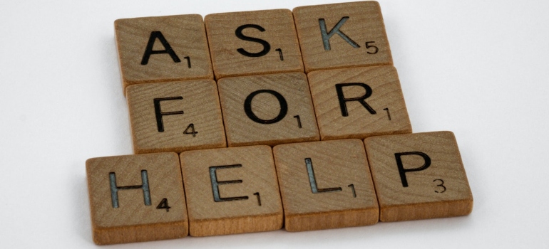 Picture of wooden letter blocks on a white surface 