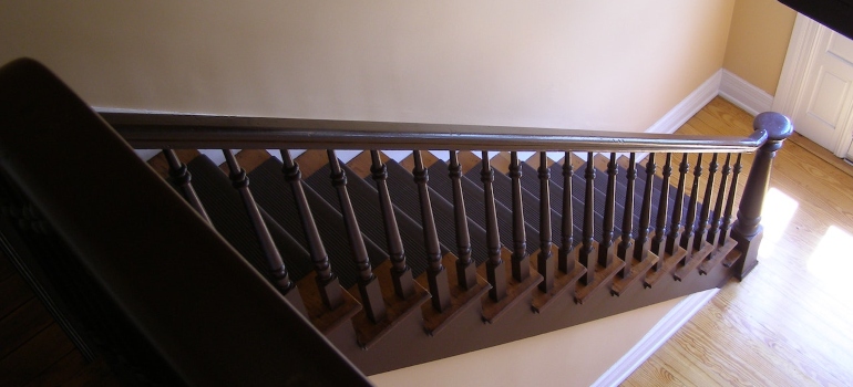 how to move a piano upstairs without damaging the wooden staircase