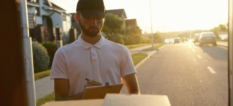 a man holding a checklist