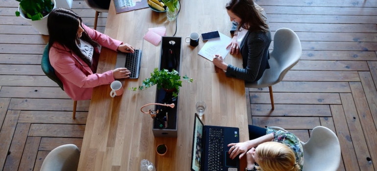 women talking about how relocating to Washington DC can boost your career