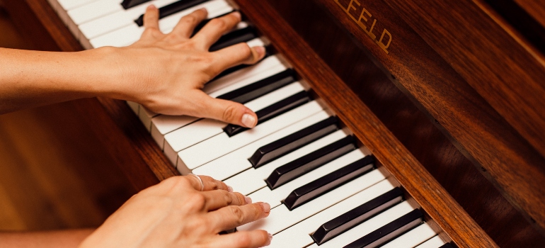 Person playing a piano