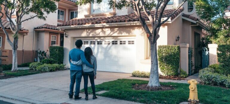 A couple looking at their new house