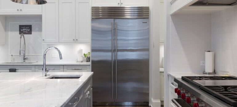 A refrigerator in the kitchen