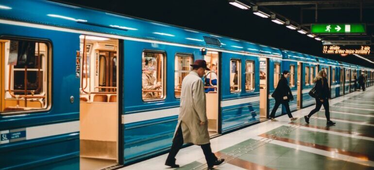 A man walking after from the subway after learning about a guide to the D.C. metro system