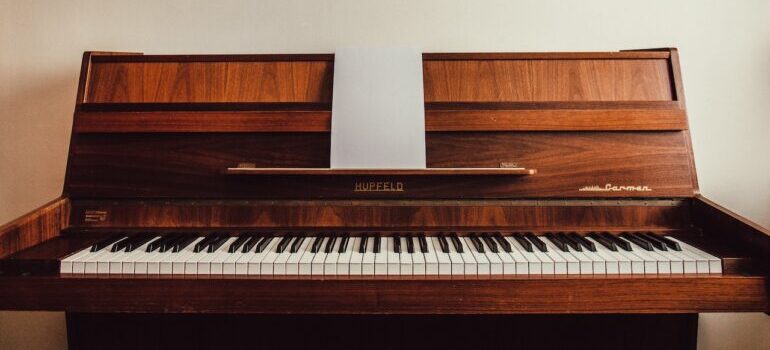 A brown upright piano