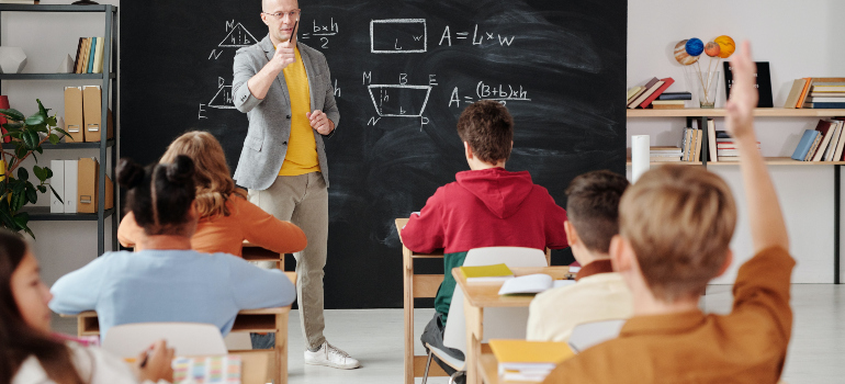 a teacher and children in class