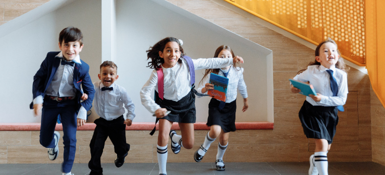 school children running around