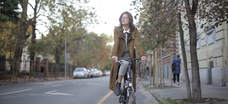 a woman riding a bike