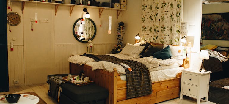 a bedroom that is in chaos because of all the clutter