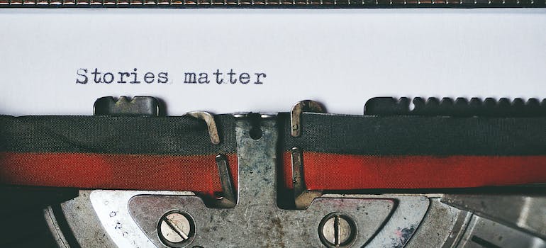 a typewriter with a piece of paper in it and words on it that say "Stories matter"