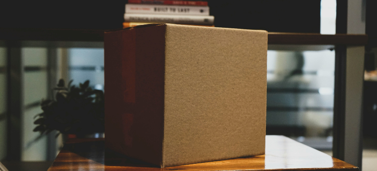 a cardboard box on a desk in an office