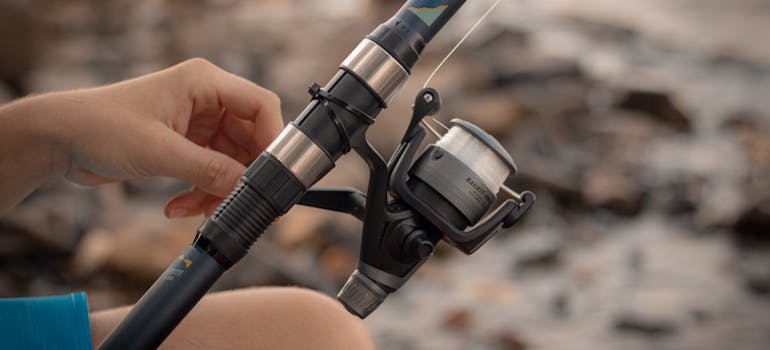 a person holding a fishing rod