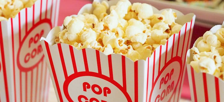 several boxes of popcorn in a cinema