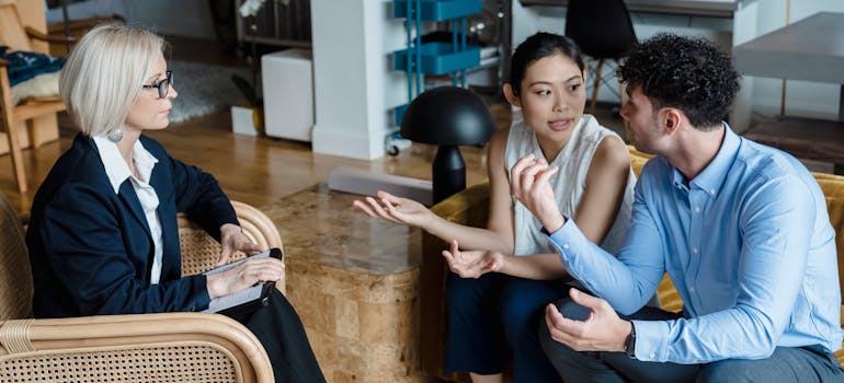 two people at a session of professional counseling which is a good strategy when your spouse doesn't want to move