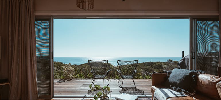 two chairs on a stunning patio with an amazing view