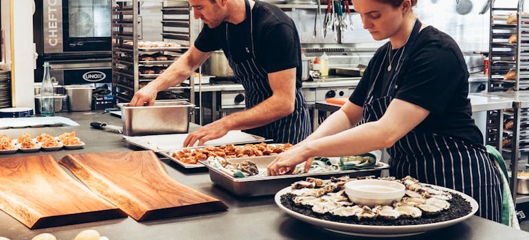 professional chefs preparing food for their clients 