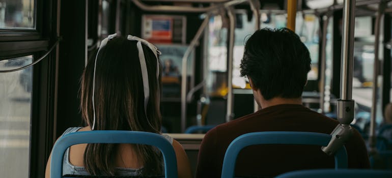 two people on the bus discussing the misconceptions about living in Washington DC