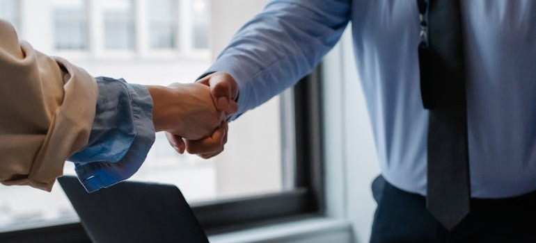 Two people shaking hands