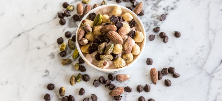 a bowl of nuts, which is a good option if you want to eat healthy when moving