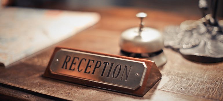 reception desk with an old-fashioned bell on it